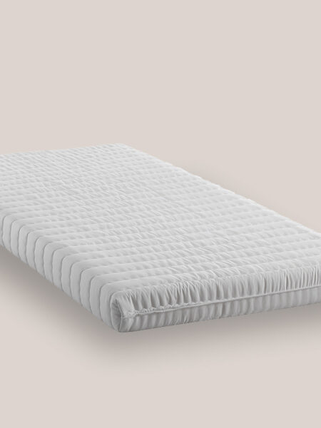 Materasso Sun su sfondo neutro tortora